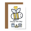 front of happy birthday card featuring smiling bee with yellow heart overherad and gifts below with qr code in one that plays happy song about growing to be who you want to be to show design