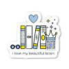 die cut vinyl sticker with row of books, heart, crown topped with sparkles and qr code that plays vocabulary song