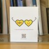 This introvert loves you card on book shelf