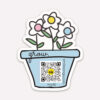 diecut sticker with pink, yellow and blue flowers and qr code that plays song to show detail