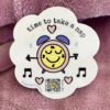 naptime sticker that sings on soft pink blanket
