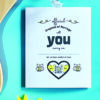 marriage proposal card next to guitar and flower on blue background