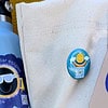 solar powered pin-back button tote bag singing pin-back button on canvas tote bag to show uses