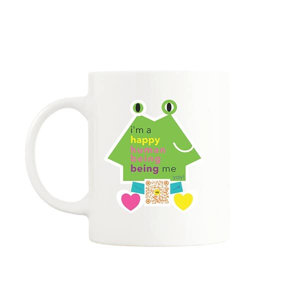 White mug featuring a cheerful character with the text 'I'm a happy human being being me,' colorful hearts, and a QR code that plays a song when scanned