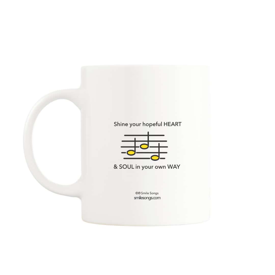 Lyric excerpt on the back of the Rise & Shine musical mug with a QR code that plays a handcrafted song