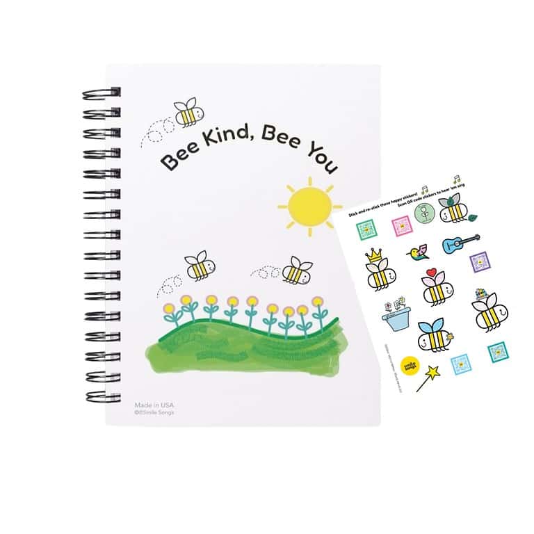 Positively Playful Activity Book by Smile Songs with musical sticker sheet for SEL activities.